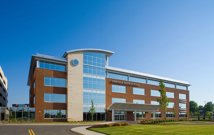 Architecture and Healthcare Photography - Exterior of Pineville Medical Plaza with deep blue sky