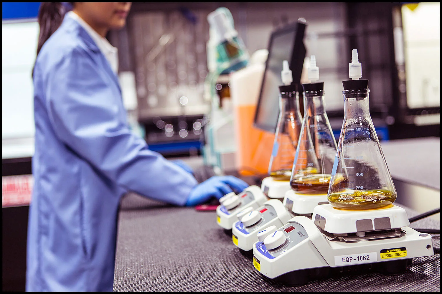 healthcare-medical-pharma-mixing MIchael LoBiondo Photography - Laboratory beakers being mixed in lab