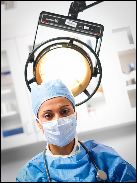 MIchael LoBiondo Photography - Doctor in surgery with light behind her