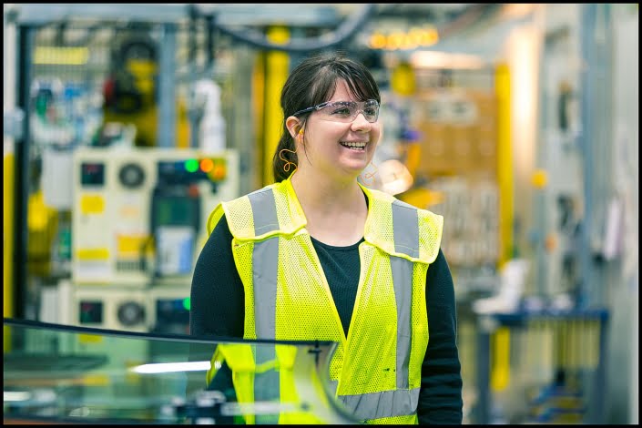 Michael LoBiondo Photography - glass windshield worker grinning at coworker