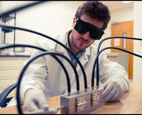 MIchael LoBiondo Photography - Lab technician with dark safety glasses in testing area