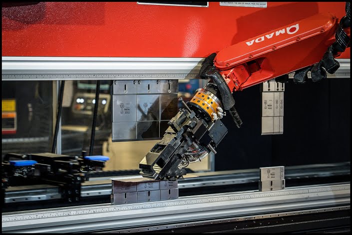 Michael LoBiondo Photography - robotic arm loading maching