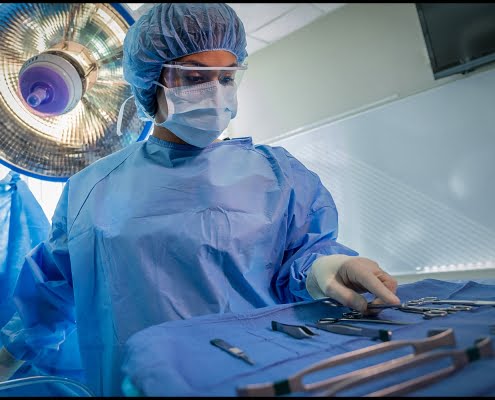 surgery-nurse-medical-instruments Michael LoBiondo Photography-Nurse sorting surgery instruments