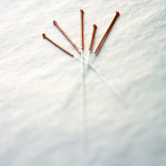 Michael LoBiondo Photography - Accupunture needles displayed on surface