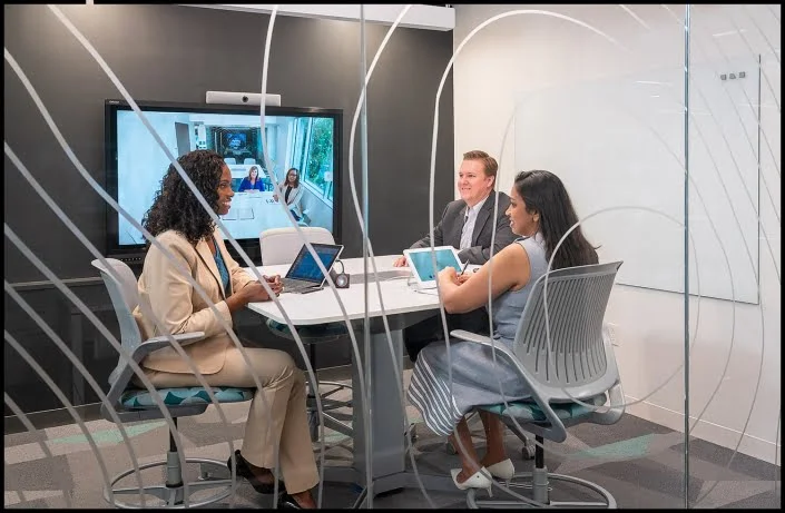 lifestyle-corporate-meeting-video-conference Michael LoBiondo Photography - Group meeting in video conference room