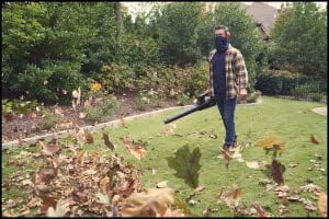 product-medical-healthcare-mask Michael LoBiondo Photography - Man blowing leaves wearing protective gaiter over mouth