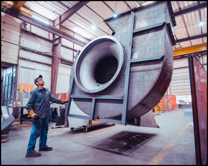 lobiondo-industrial-manufacturing-hvac Michael LoBiondo Photography - Worker moving large air handler blower