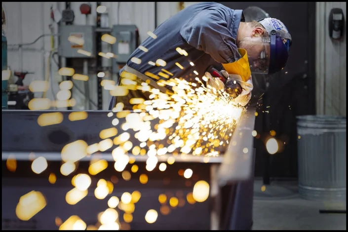 lobiondo-sparks-manufacturing Michael LoBiondo Photography - grinding metalwork - shot by professional industrial photographer Michael LoBiondo