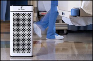 product-safety-air-handler-medical-healthcare Michael LoBiondo Photography - nurse walking behind air handler in hospital room