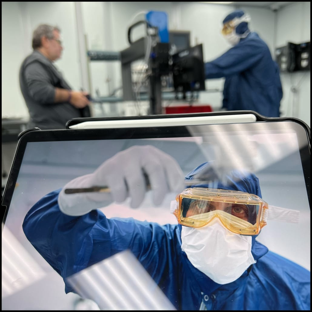Behind the scenes of a pharmaceutical photography session inside a cleanroom environment Behind the scenes of a pharmaceutical photography session inside a cleanroom environment