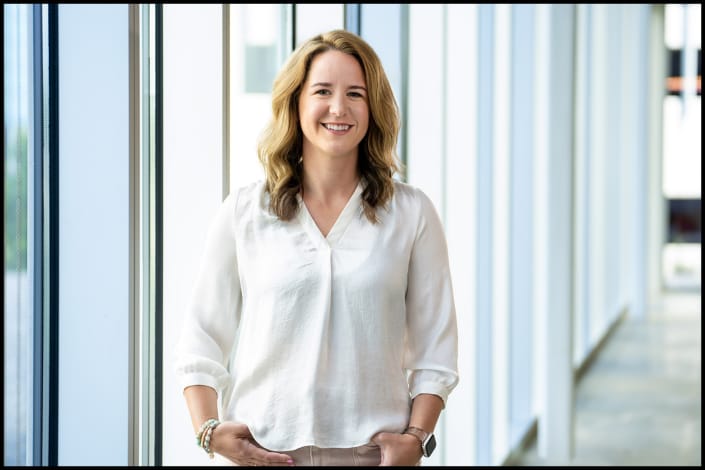 Corporate environmental portrait of a professional woman in a modern office Corporate environmental portrait of a professional woman in a modern office