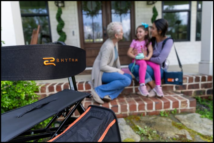 Portable oxygen concentrator beside family during home healthcar