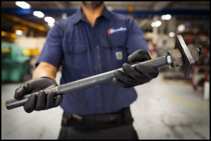 industrial-metal-component-product-photography-4243 Industrial worker holding a fabricated metal component for product photography